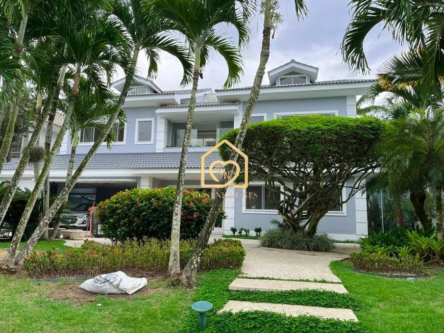 Foto 1 de Casa de Condomínio com 5 Quartos à venda, 1100m² em Barra da Tijuca, Rio de Janeiro