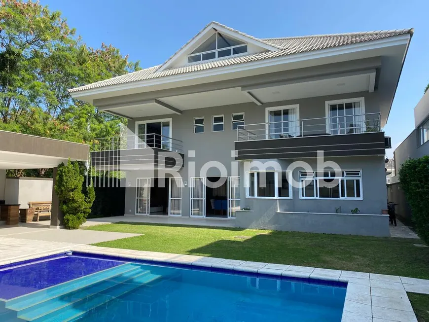 Foto 1 de Casa de Condomínio com 4 Quartos à venda, 585m² em Barra da Tijuca, Rio de Janeiro