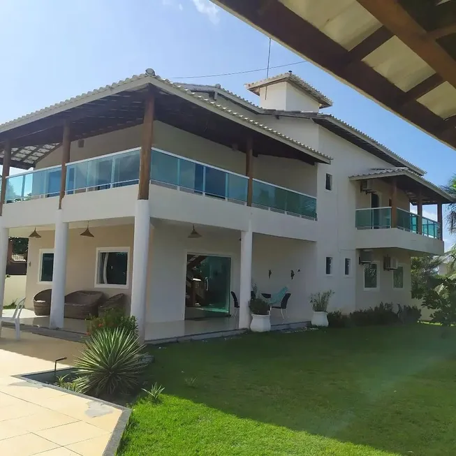 Foto 1 de Casa de Condomínio com 5 Quartos à venda, 600m² em Barra do Jacuípe, Camaçari