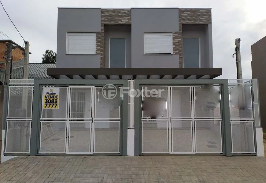 Foto 1 de Casa com 3 Quartos à venda, 103m² em Guarujá, Porto Alegre