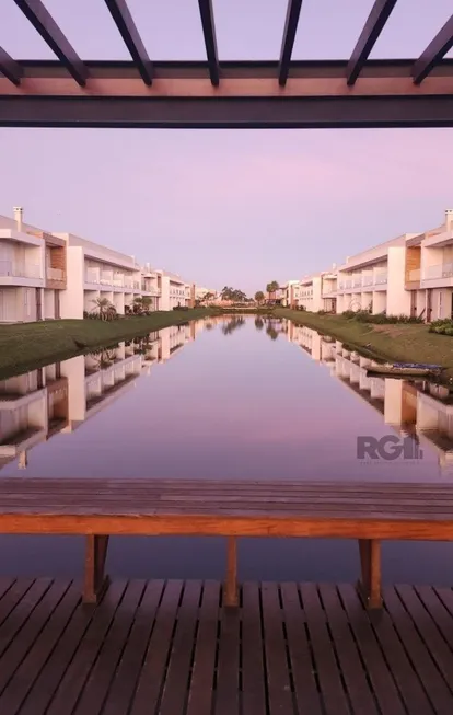 Foto 1 de Casa de Condomínio com 4 Quartos à venda, 161m² em Zona Nova, Capão da Canoa