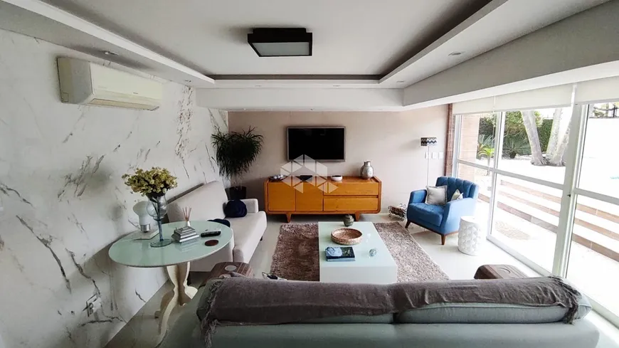 Foto 1 de Casa com 3 Quartos à venda, 280m² em Guarujá, Porto Alegre