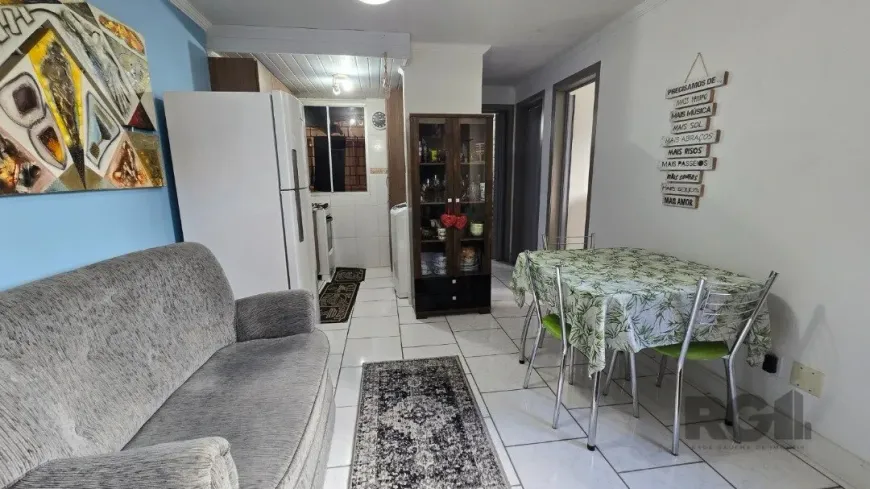 Foto 1 de Apartamento com 2 Quartos à venda, 38m² em Vila Nova, Porto Alegre