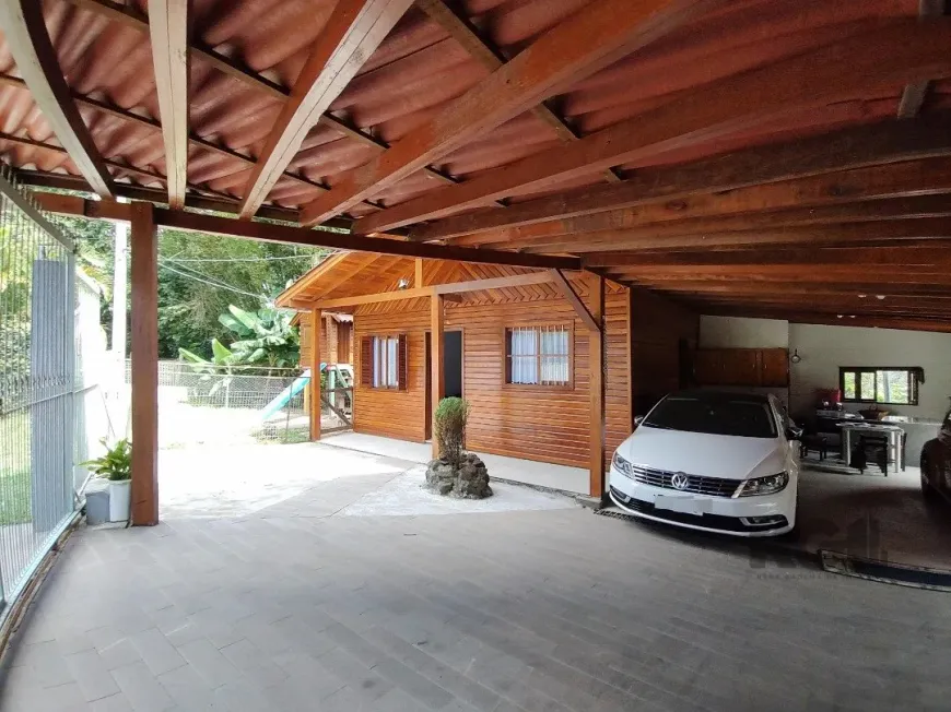 Foto 1 de Casa com 4 Quartos à venda, 110m² em Cavalhada, Porto Alegre