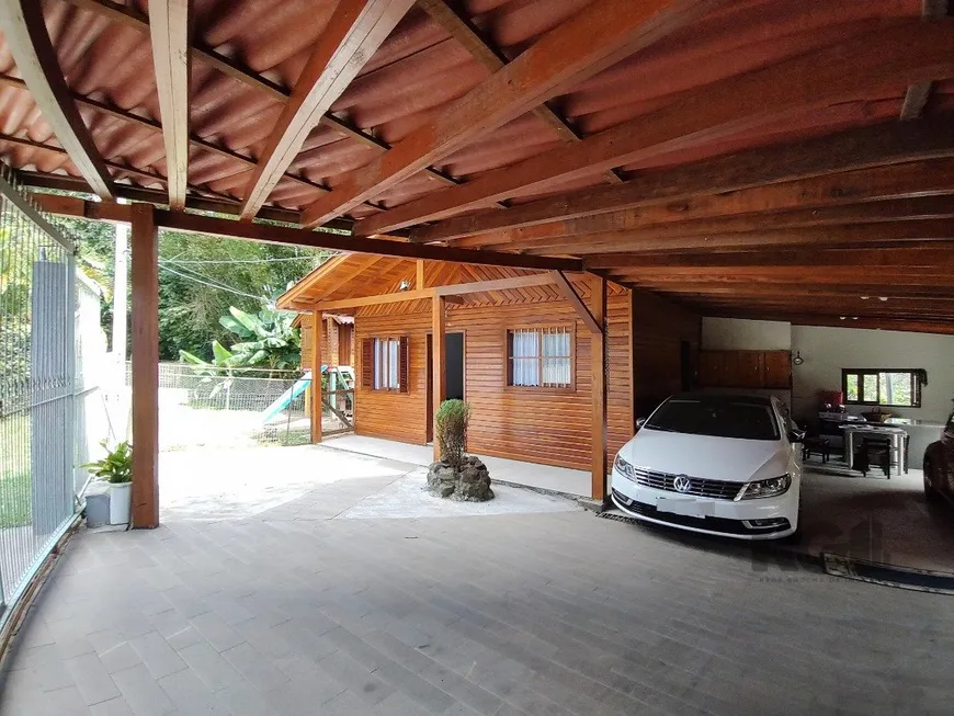 Foto 1 de Casa com 4 Quartos à venda, 111m² em Cavalhada, Porto Alegre