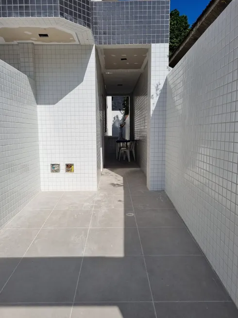 Foto 1 de Casa de Condomínio com 3 Quartos à venda, 85m² em Embaré, Santos