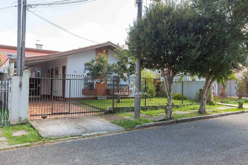 Foto 1 de Casa com 4 Quartos à venda, 180m² em Jardim das Américas, Curitiba