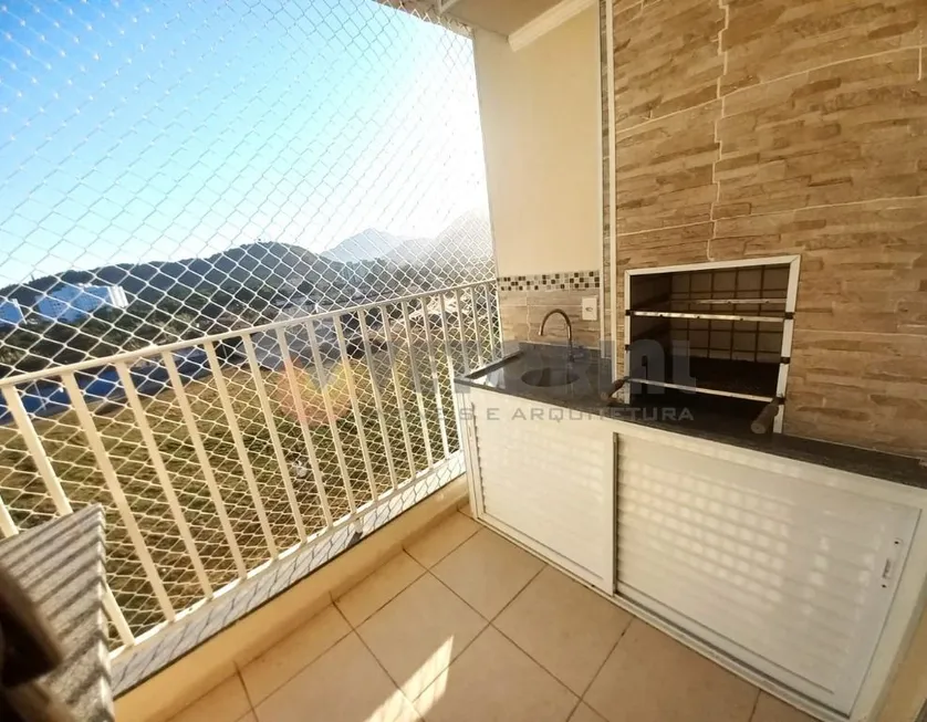 Foto 1 de Apartamento com 2 Quartos à venda, 53m² em Martim de Sa, Caraguatatuba