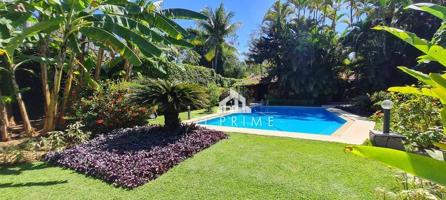 Foto 1 de Casa de Condomínio com 4 Quartos à venda, 530m² em Barra da Tijuca, Rio de Janeiro