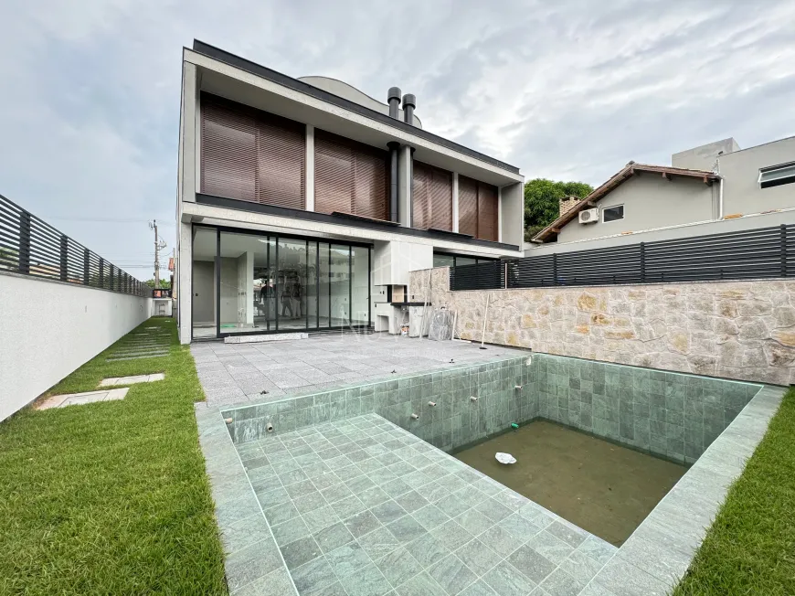 Foto 1 de Casa com 3 Quartos à venda, 300m² em Jurerê, Florianópolis