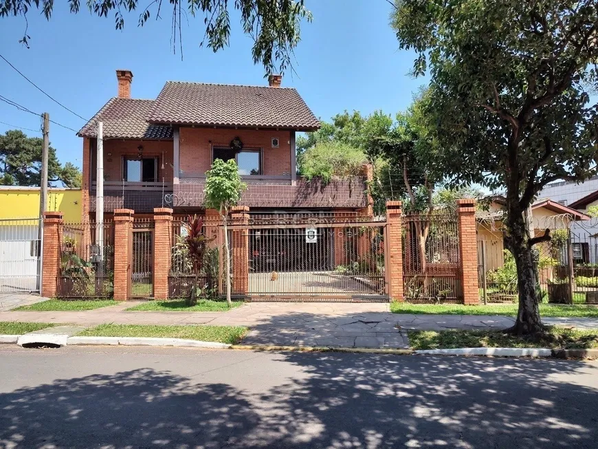 Foto 1 de Casa com 4 Quartos à venda, 212m² em Floresta, Porto Alegre