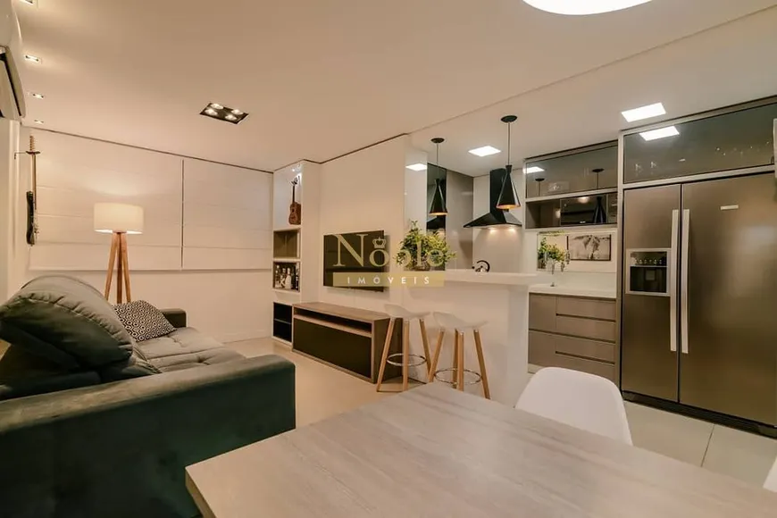 Foto 1 de Apartamento com 2 Quartos à venda, 59m² em Igra Norte, Torres