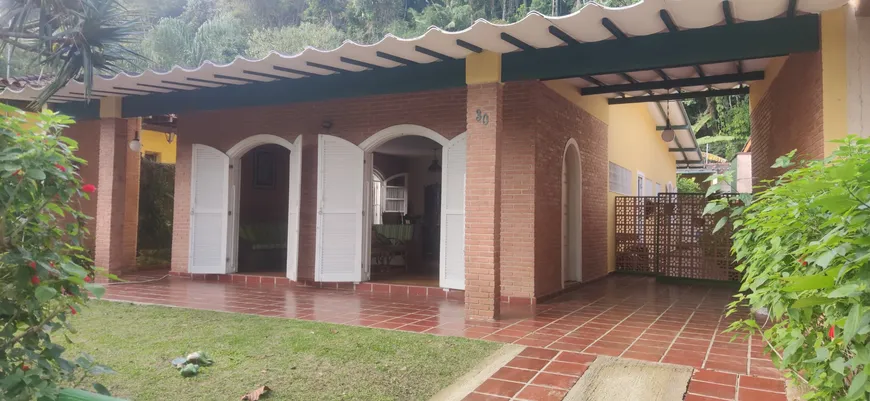 Foto 1 de Casa com 5 Quartos à venda, 300m² em Balneário Praia do Perequê , Guarujá