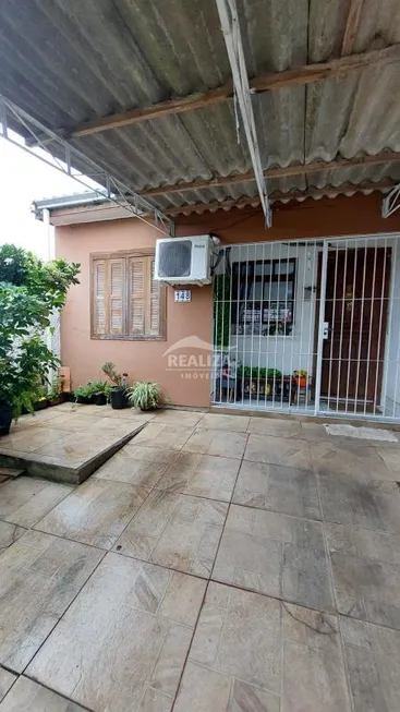 Foto 1 de Casa com 2 Quartos à venda, 55m² em Martinica, Viamão