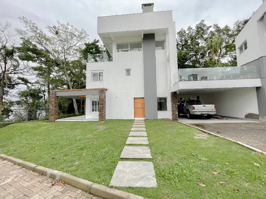 Foto 1 de Casa de Condomínio com 4 Quartos para alugar, 335m² em Pedra Redonda, Porto Alegre