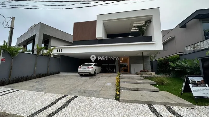 Foto 1 de Casa de Condomínio com 6 Quartos à venda, 380m² em Riviera de São Lourenço, Bertioga