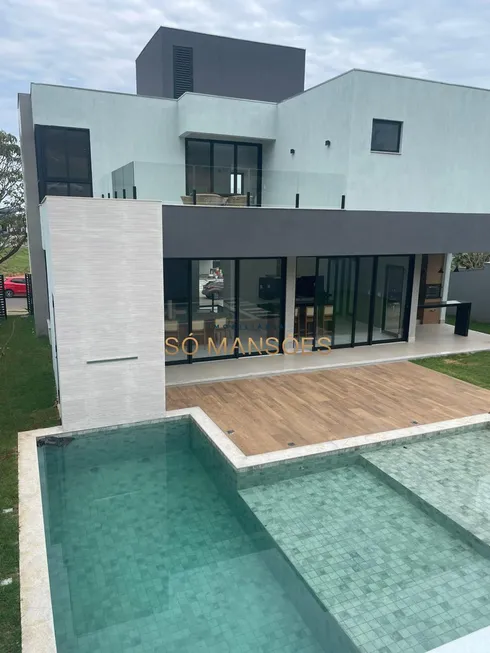 Foto 1 de Casa de Condomínio com 5 Quartos à venda, 340m² em Alphaville, Vespasiano