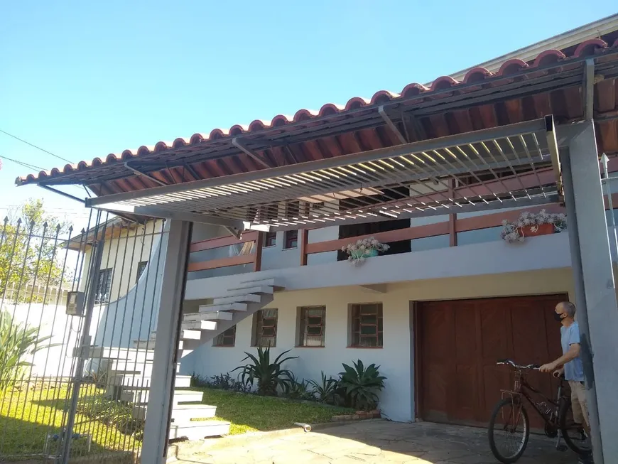Foto 1 de Casa com 3 Quartos à venda, 201m² em Cavalhada, Porto Alegre