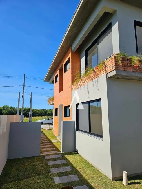 Foto 1 de Apartamento com 2 Quartos à venda, 71m² em Araçatuba, Imbituba