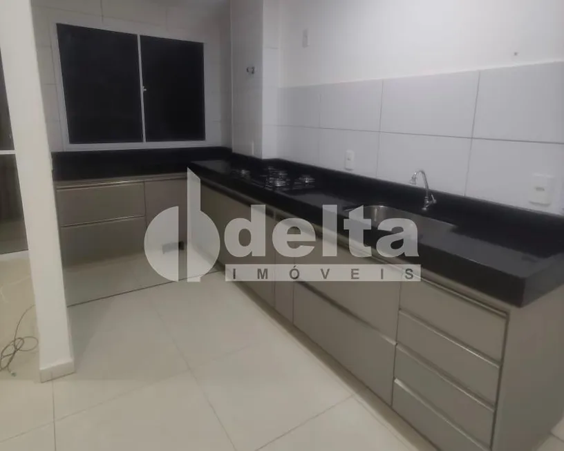 Foto 1 de Apartamento com 2 Quartos à venda, 57m² em Jardim Holanda, Uberlândia