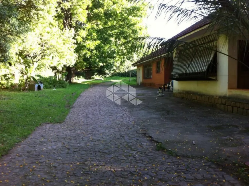 Foto 1 de Lote/Terreno à venda, 8000m² em Teresópolis, Porto Alegre