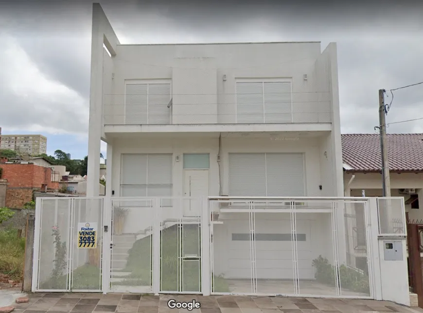 Foto 1 de Casa com 4 Quartos à venda, 562m² em Santo Antônio, Porto Alegre