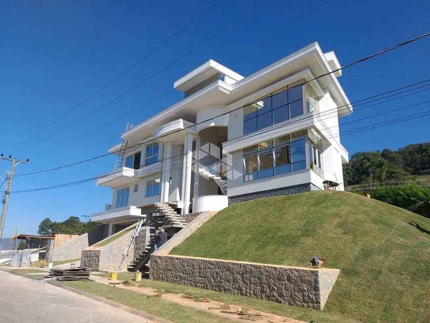 Foto 1 de Casa de Condomínio com 4 Quartos à venda, 445m² em Pedra Branca, Palhoça