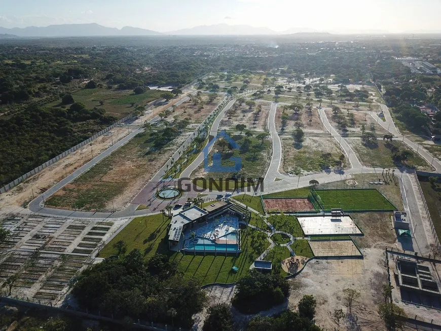 Foto 1 de Lote/Terreno à venda, 386m² em Jacunda, Aquiraz