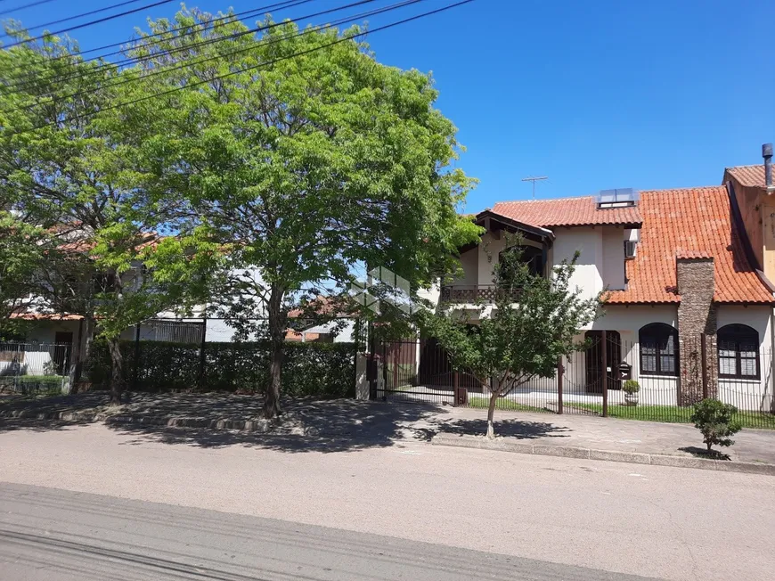 Foto 1 de Casa com 5 Quartos à venda, 287m² em Jardim Itú Sabará, Porto Alegre