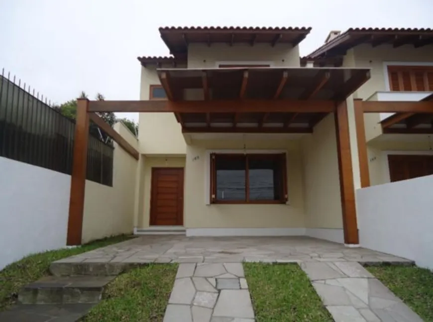 Foto 1 de Casa com 3 Quartos à venda, 124m² em Cavalhada, Porto Alegre