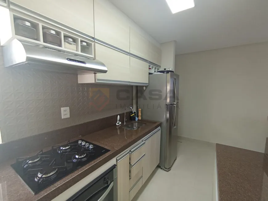 Foto 1 de Apartamento com 2 Quartos à venda, 56m² em Praia da Baleia, Serra