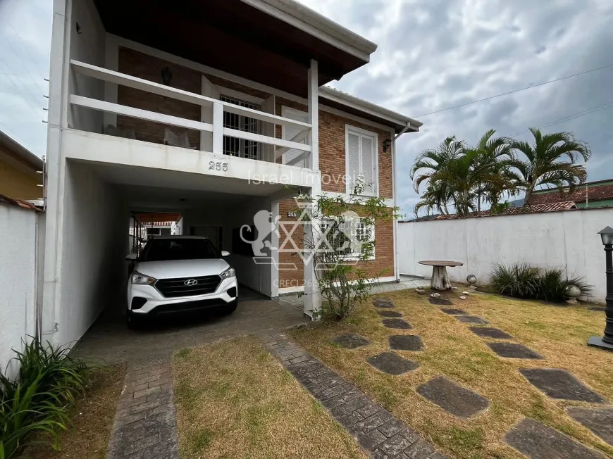 Foto 1 de Sobrado com 4 Quartos à venda, 270m² em Martim de Sa, Caraguatatuba