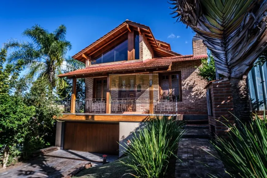 Foto 1 de Casa de Condomínio com 3 Quartos à venda, 231m² em Cantegril, Viamão