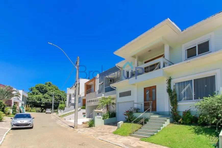 Foto 1 de Casa de Condomínio com 5 Quartos à venda, 270m² em Hípica, Porto Alegre