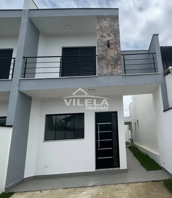 Foto 1 de Sobrado com 3 Quartos à venda, 108m² em Balneário dos Golfinhos , Caraguatatuba