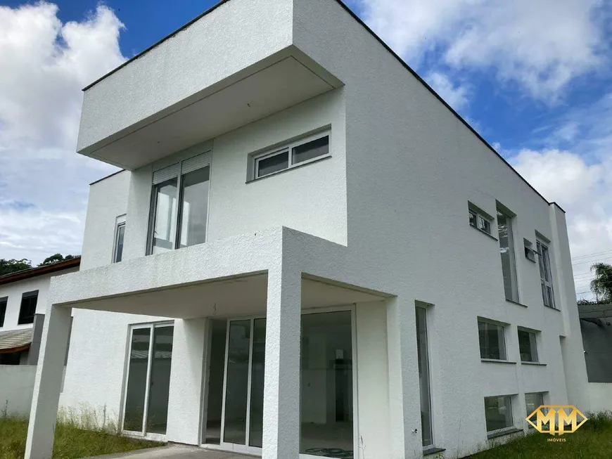 Foto 1 de Casa de Condomínio com 5 Quartos à venda, 288m² em Cachoeira do Bom Jesus, Florianópolis