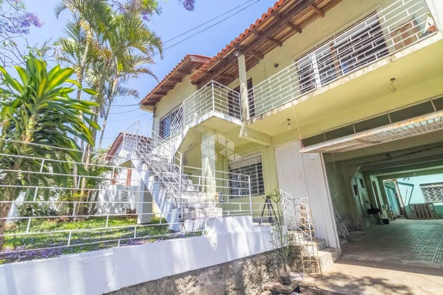 Foto 1 de Casa com 4 Quartos à venda, 200m² em Partenon, Porto Alegre