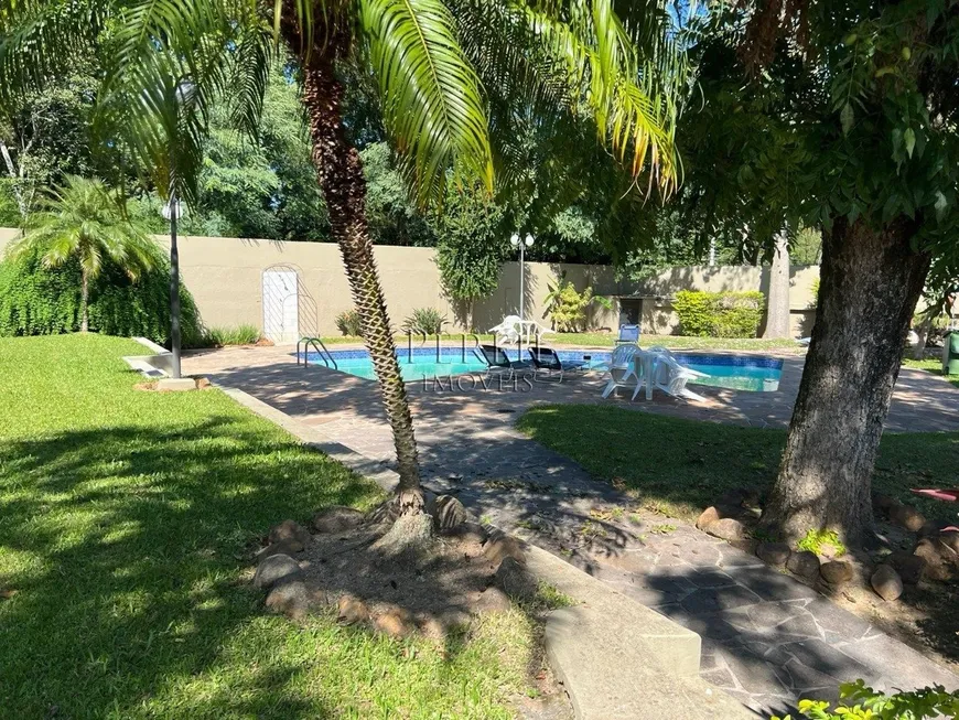 Foto 1 de Casa de Condomínio com 5 Quartos para venda ou aluguel, 305m² em Pedra Redonda, Porto Alegre