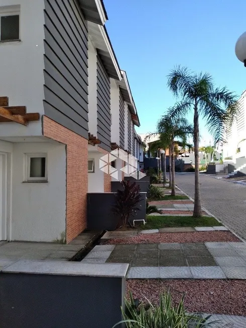 Foto 1 de Casa de Condomínio com 3 Quartos à venda, 134m² em Vila Nova, Porto Alegre