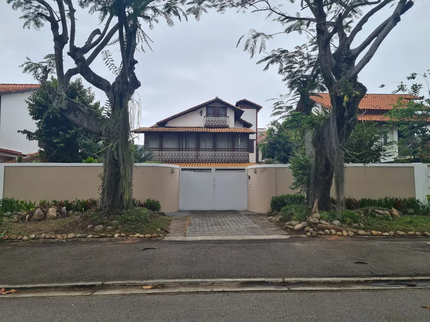 Foto 1 de Casa com 6 Quartos à venda, 311m² em Barra da Tijuca, Rio de Janeiro