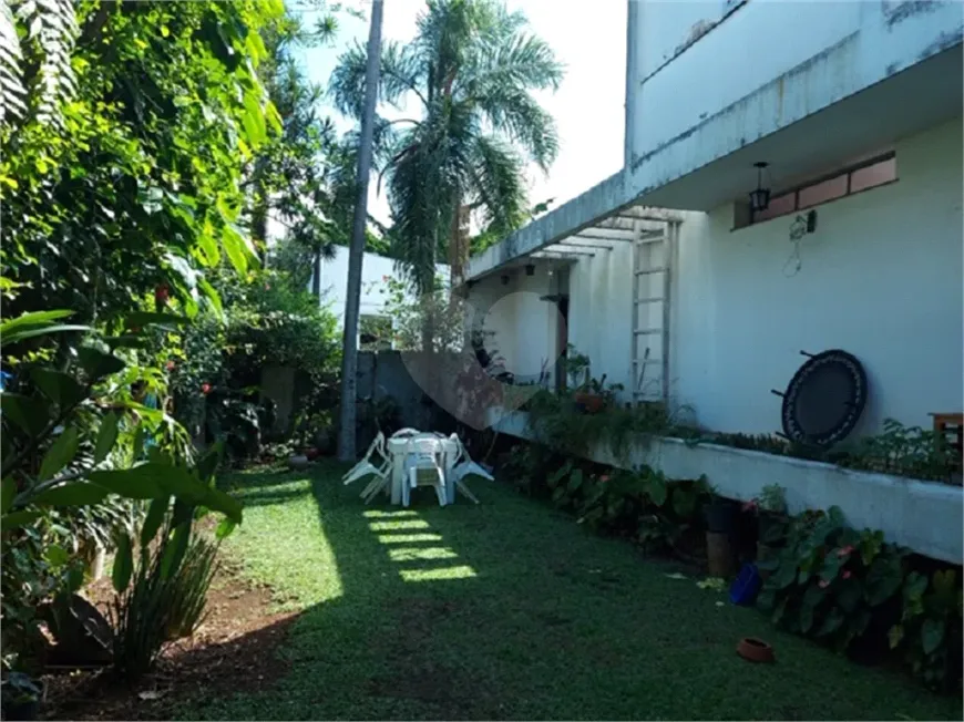 Foto 1 de Sobrado com 4 Quartos à venda, 413m² em Moema, São Paulo