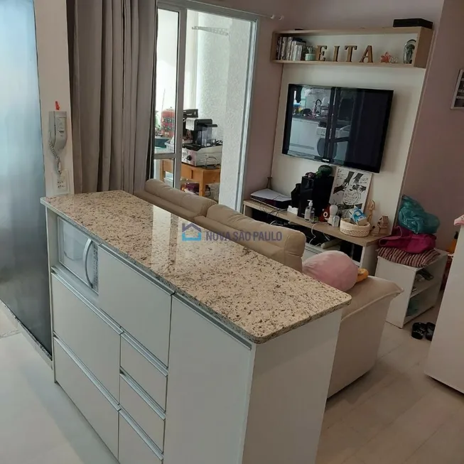 Foto 1 de Apartamento com 2 Quartos à venda, 59m² em Vila Paulista, São Paulo