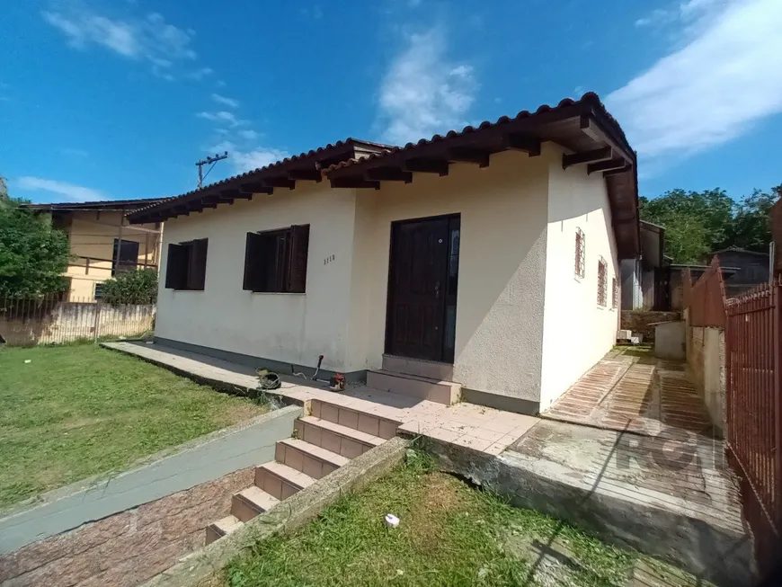 Foto 1 de Casa com 3 Quartos à venda, 104m² em Tarumã, Viamão