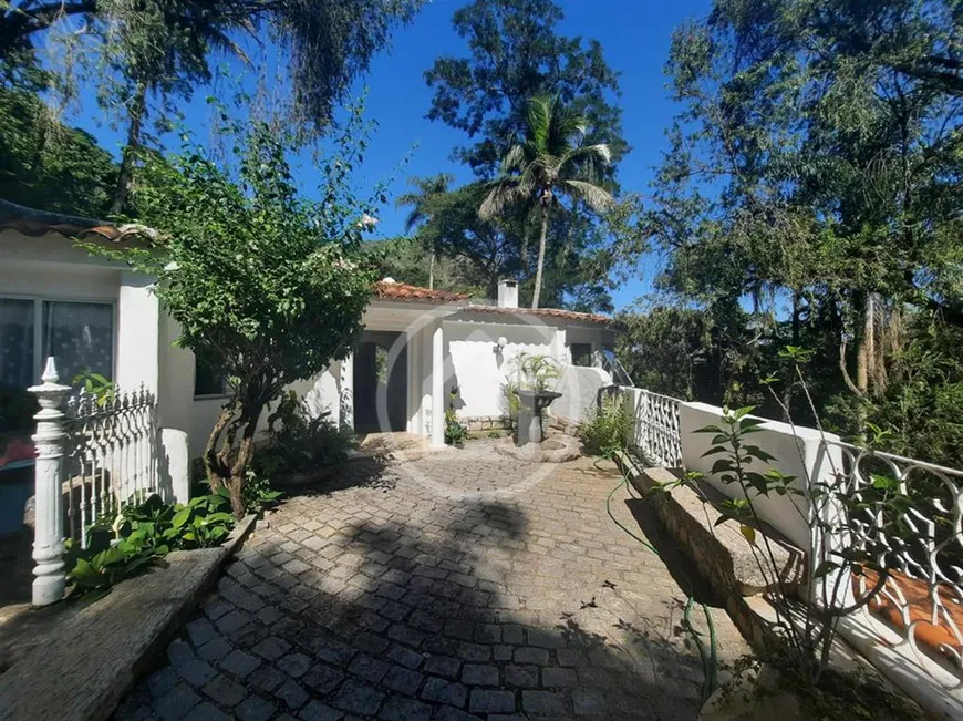 Foto 1 de Casa de Condomínio com 4 Quartos à venda, 460m² em Itanhangá, Rio de Janeiro