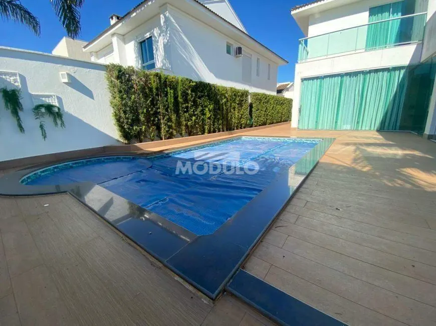 Foto 1 de Casa de Condomínio com 3 Quartos à venda, 300m² em Gávea, Uberlândia