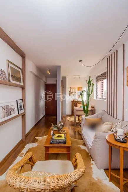 Foto 1 de Apartamento com 3 Quartos à venda, 106m² em Passo da Areia, Porto Alegre