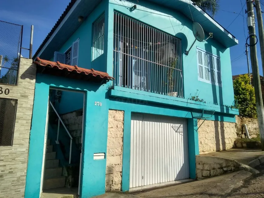 Foto 1 de Casa com 3 Quartos à venda, 154m² em Krahe, Viamão