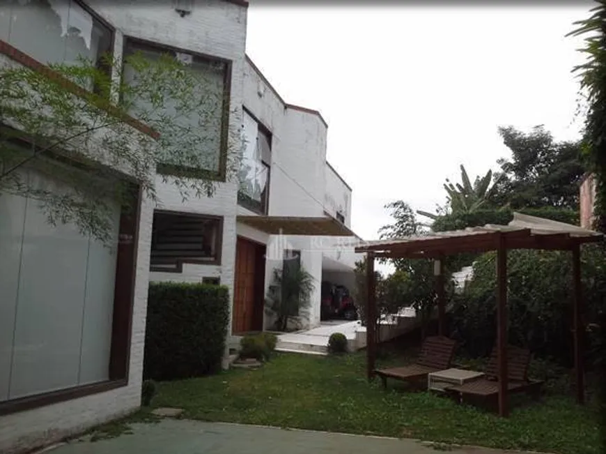 Foto 1 de Casa de Condomínio com 4 Quartos para venda ou aluguel, 1360m² em Tamboré, Barueri