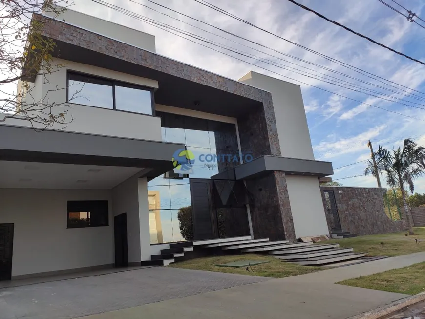 Foto 1 de Casa de Condomínio com 4 Quartos à venda, 356m² em Condomínio Belvedere, Cuiabá