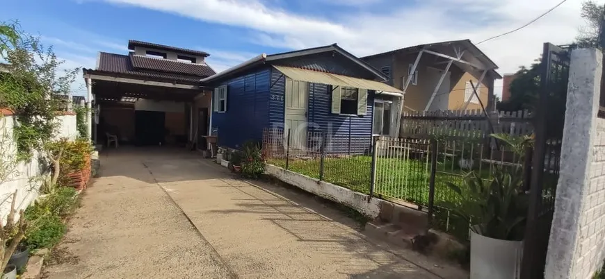 Foto 1 de Casa com 2 Quartos à venda, 200m² em Hípica, Porto Alegre